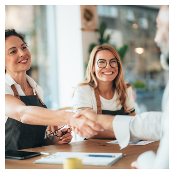 Two business women agree to a business loan