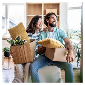 Couple smiling in their new home